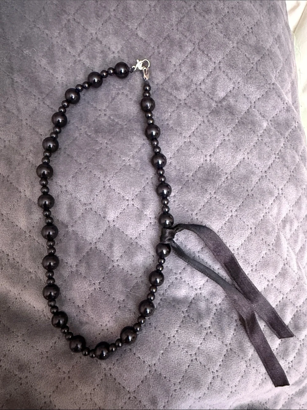 Classic Black Beaded Necklace with Ribbon Accent